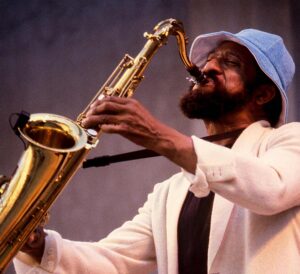 Colour photograph of Sonny Rollins playing the saxophone.